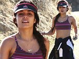 Perks of warm winters! Make-up free Vanessa Hudgens bared her taut tummy on a hike with a gal pal in Los Angeles, California on Thursday