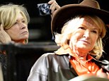 Wearing a bright orange shirt and leather jacket, Martha got into the spirit of the event and topped off her look with the brown hat.
