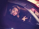 Pictured: Miley Cyrus and pal 'drag race' fan down Sunset Blvd... in a Smart car