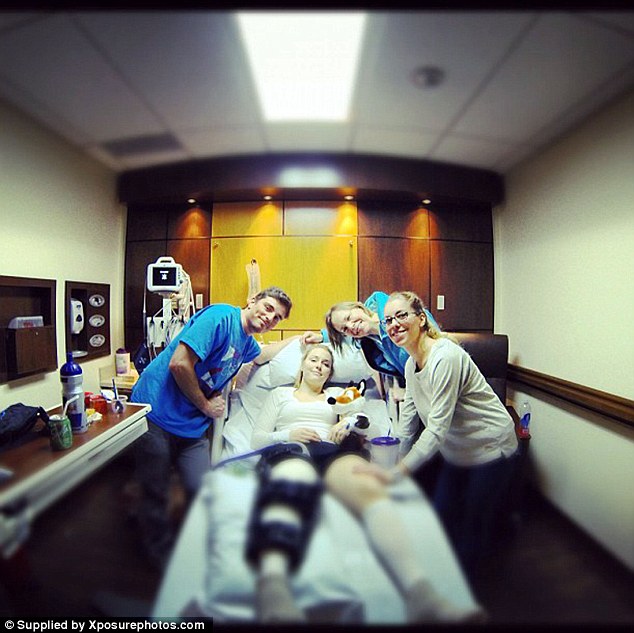 Complicated surgery: This picture shows Lindsey Vonn and her team as she recovered from her surgical reconstruction of her right knee following her accident in Austria in February 2013