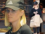 Stocking her wardrobe: Reese Witherspoon was seen shopping for athletic wear at Frontrunners in Brentwood on Wednesday