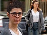 Make-up free Marisa Tomei wears drab cardigan and grungy boyfriend jeans for lunch on Melrose