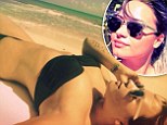 'Feeling healthy and rested': Bikini-clad Demi Lovato shows off her toned tummy on a tropical beach in new Instagram snap