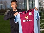 Champions League hero to Villan: Ryan Bertrand poses with an Aston Villa shirt after his loan move is confirmed
