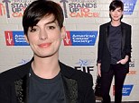 Zoebot in disguise! Anne Hathaway looks better than ever following breakup with celebrity stylist Rachel as she wears trouser suit to charity function