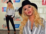 Forget The Voice...she's got the body: Christina Aguilera shows off toned, trim body in super-skinny jeans and unbuttoned shirt