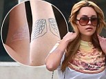Erasing the past: Amanda Bynes marks fresh start by undergoing laser treatment to remove angel wings tattoo from arm