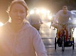 On the road: Naomi Watts and Liev Schreiber took their sons for a day of cycling but failed to use safety lights
