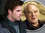 Liam Hemsworth back at work on The Hunger Games set following sudden death of co-star Philip Seymour Hoffman
