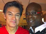 Too young: 50-year-old celebrity mixologist Darryl Robinson (here with Dr. Oz) was found dead in his Brooklyn apartment Wednesday from unknown causes