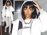 She'd look good in anything! Rihanna heads out to dinner in an all-white tracksuit... following night out with Drake