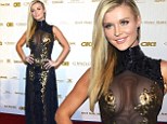 Sheer appeal! Joanna Krupa sizzles in cleavage-baring black and gold-embellished gown at pre-Oscar bash