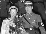 The ultimate goal: Standartenfuehrer Richard Fiedler during his wedding ceremony with Ursula Flamm in 1936, was attended by Joseph Goebbels, pictured behind the happy couple