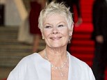 Not at the Oscars: Judi Dench couldn't make it to the award ceremony on Sunday due to filming commitments in India, but a nominee's wife was mistaken for the actress on the red carpet