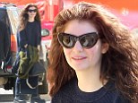 Lorde was spotted sporting looking grunge chic in a matching navy sloppy joe-like blouse and maxi skirt in Hollywood on Monday