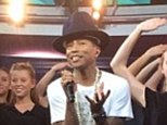 Happy: Pharrell Williams performed with the Australian Girls Choir on Sunrise in Sydney on Thursday morning