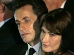 Nicolas Sarkozy (left) was 'kept' by his far wealthier wife Carla Bruni-Sarkozy (right) during his time as French President