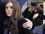 She could be next! Elizabeth Olsen puts on affectionate display with boyfriend Boyd Holbrook in Paris... after sister Mary-Kate's recent engagement