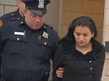 Santos Elena Ruiz Solano leaves court in handcuffs after pleading not guilty to murder charges.