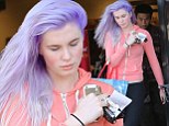 'It's temporary and fun!': Ireland Baldwin on her new purple mane as she steps out for the first time since dramatic dye job