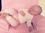 Queen of the castle! Alec Baldwin shared this precious photo of six-month-old daughter Carmen taking a nap sprawled across her pink and white polka-dot armchair embroidered with her initials on Wednesday