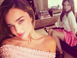 Pretty in pink! Miranda Kerr is flirty in a bright mini skirt as new face of H&M gives sneak peek at new Spring/Summer range