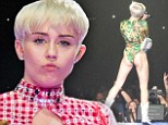 We Can't... remember the words! Miley Cyrus uses teleprompters to display her OWN lyrics on Bangerz tour