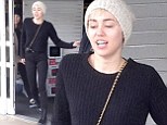 Homemaker Miley! Singer Cyrus shops for household items during break from Bangerz tour in black skinnies and chunky boots