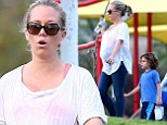 She's already got her hands full! Pregnant Kendra Wilkinson shows off her growing bump as she takes energetic son Hank to the park