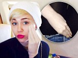 Miley Cyrus poses with adult toy aboard her private plane