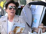 How luxe: Kris Jenner held on the luxury publication against her chest
