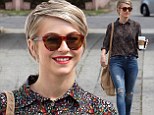 Girly and edgy: Julianne Hough sported a lovely floral blouse tucked into high waisted ripped skinny jeans as she stepped out on Friday