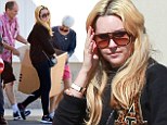 She's Easy A-Okay: Amanda Bynes looks happy and healthy as she picks up boxes from a storage unit with her parents
