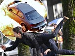 Grant Gustin flies through the air as he escapes car crash explosion on set of upcoming TV series The Flash