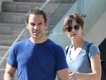 Back together? Katharine McPhee was pictured with her husband Nick Cokas in Los Angeles on Monday, for the first time since she was seen kissing another man