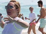 Wet T-shirt contest? Marysol Patton hits Miami Beach braless in a see-through white top with mystery man in tow