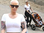 Amber Rose goes for a hike while pushing her son along in his pram