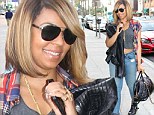 Taking it in her stride! Ashanti is all smiles in Beverly Hills as her alleged stalker is escorted out of a New York courtroom after ranting at judge