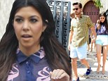 Just the two of us! Kourtney Kardashian is stylish in shorts and shirt as she and Scott Disick skip DASH store event to hit beach