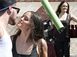 It takes two to tango! Recently divorced Danica McKellar shares a smooch with her DWTS pro Val Chmerkovskiy after rehearsal