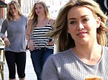 From fit to fab! Hilary Duff shows off her slender figure in two different outfits as she goes from the gym to the recording studio