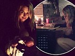 'Multitasking Mama!': Teresa Palmer signs a friends birthday present while breastfeeding her son at a birthday party in LA on Sunday