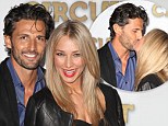 Revving up their romance! The Bachelor's Tim Robards and Anna Heinrich take their love trackside in Melbourne