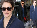 Something to hide? Divergent co-stars Theo James and Shailene Woodley jet into LAX separately as romance rumours heat up