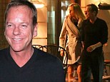 Making the most of his time: Kiefer Sutherland was spotted with a mystery blonde during an evening out in the capital 