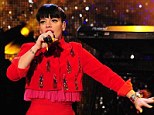 Red devil: Lily sings her heart out on The Graham Norton Show last month
