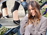 She's REALLY trying to make them happen! Sarah Jessica Parker steps out again in stirrup leggings as she teams them with navy floral dress