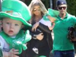 Fergie and Josh Duhamel dress in green, matching son Axl's leprechaun hat, for a St. Pat's party in Los Angeles Sunday