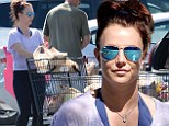 Back on mom duty: Britney Spears hits her local supermarket dressed in gym clothes after returning home from sister Jamie Lynn's Louisiana wedding