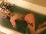 Bath time: Lady Gaga shared an image of herself on Friday cleaning up after a messy SXSW performance